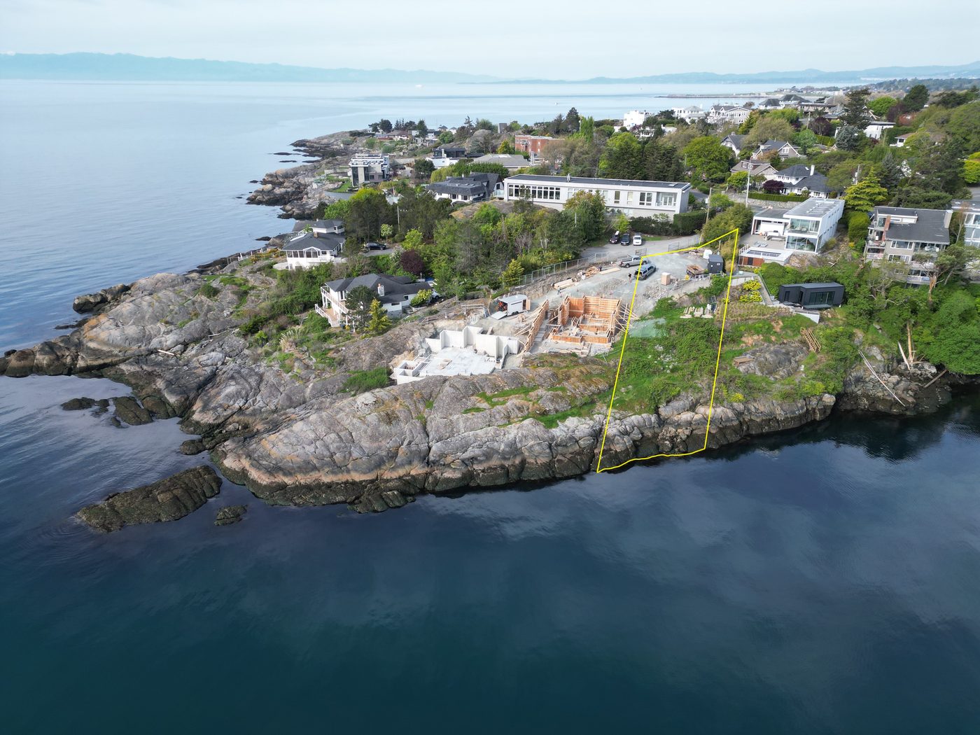 McNeill Pointe Lot A — aerial view showing lot boundary, construction underway on King George Terrace, Oak Bay